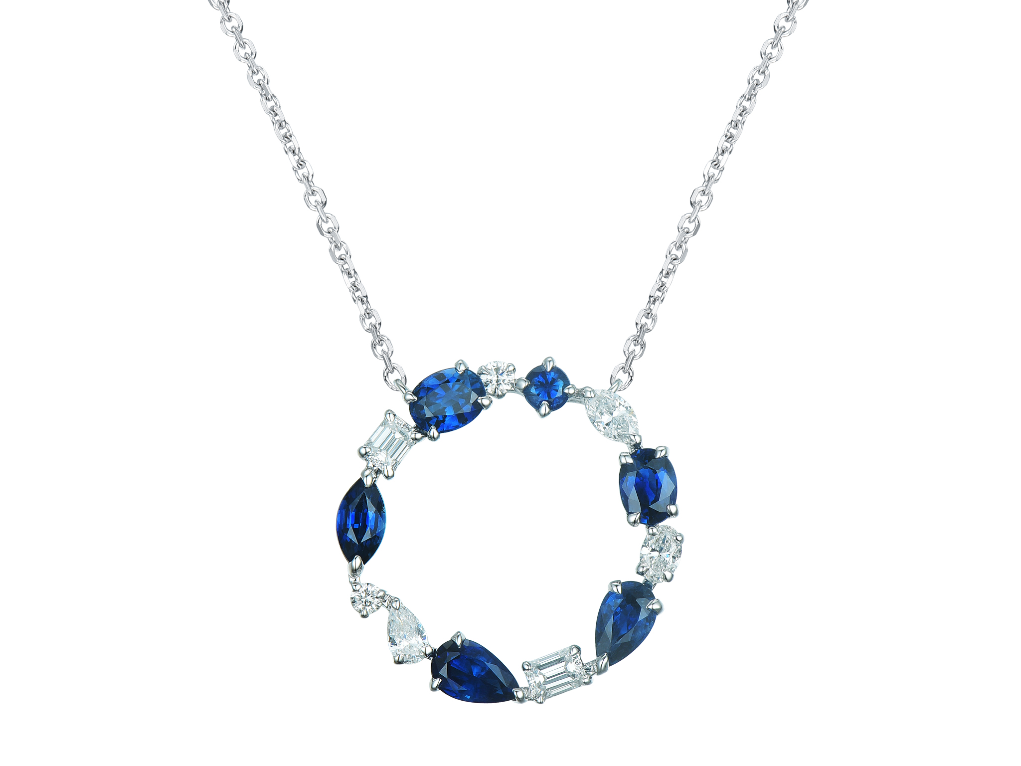 Haakonsen rundt anheng med safirer og diamanter i hvitt gull  0.39 ct.