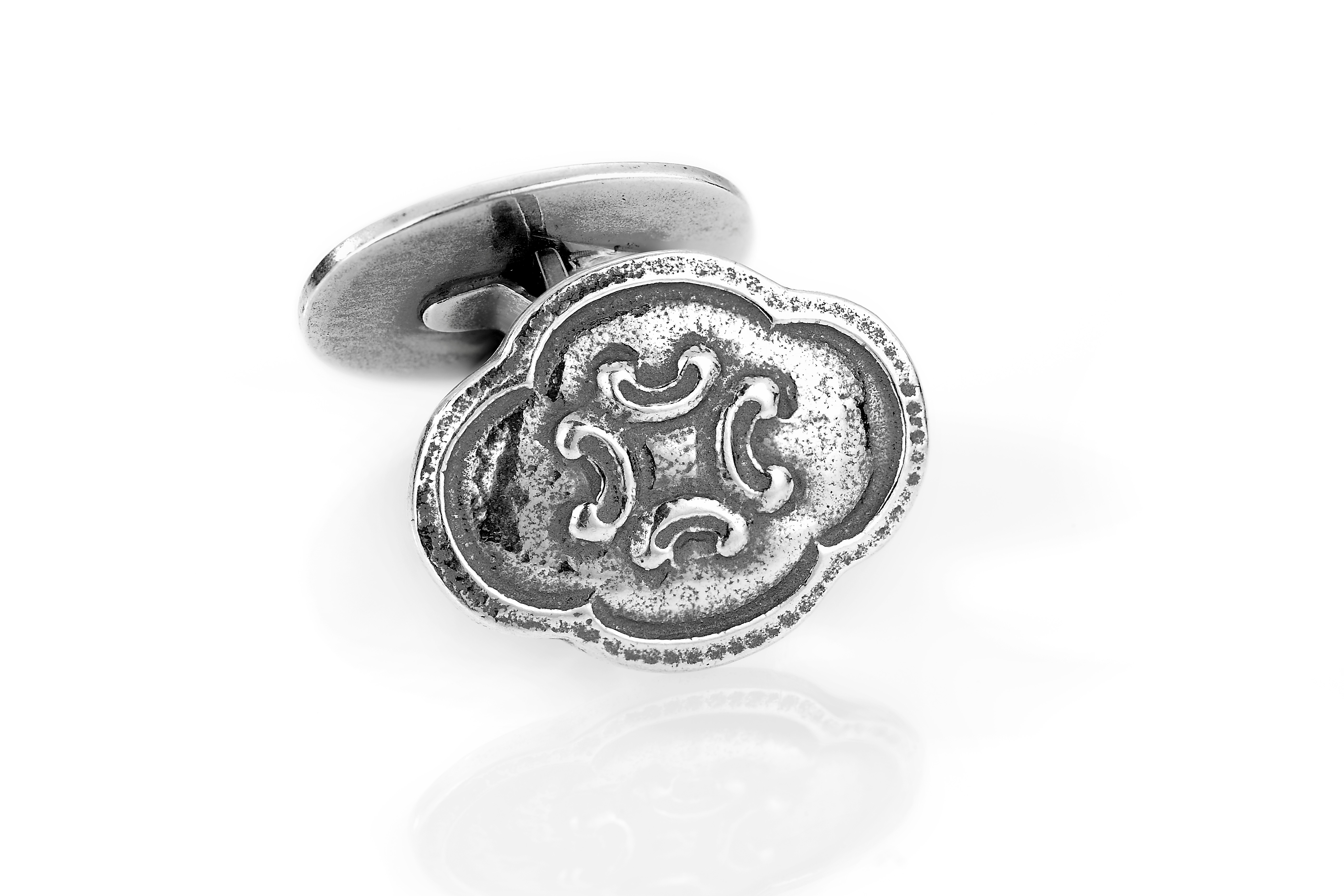 Haakonsen mansjettknapper.