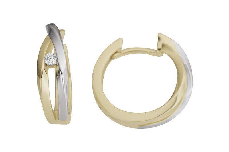 Haakonsen øreringer i gull med diamant.