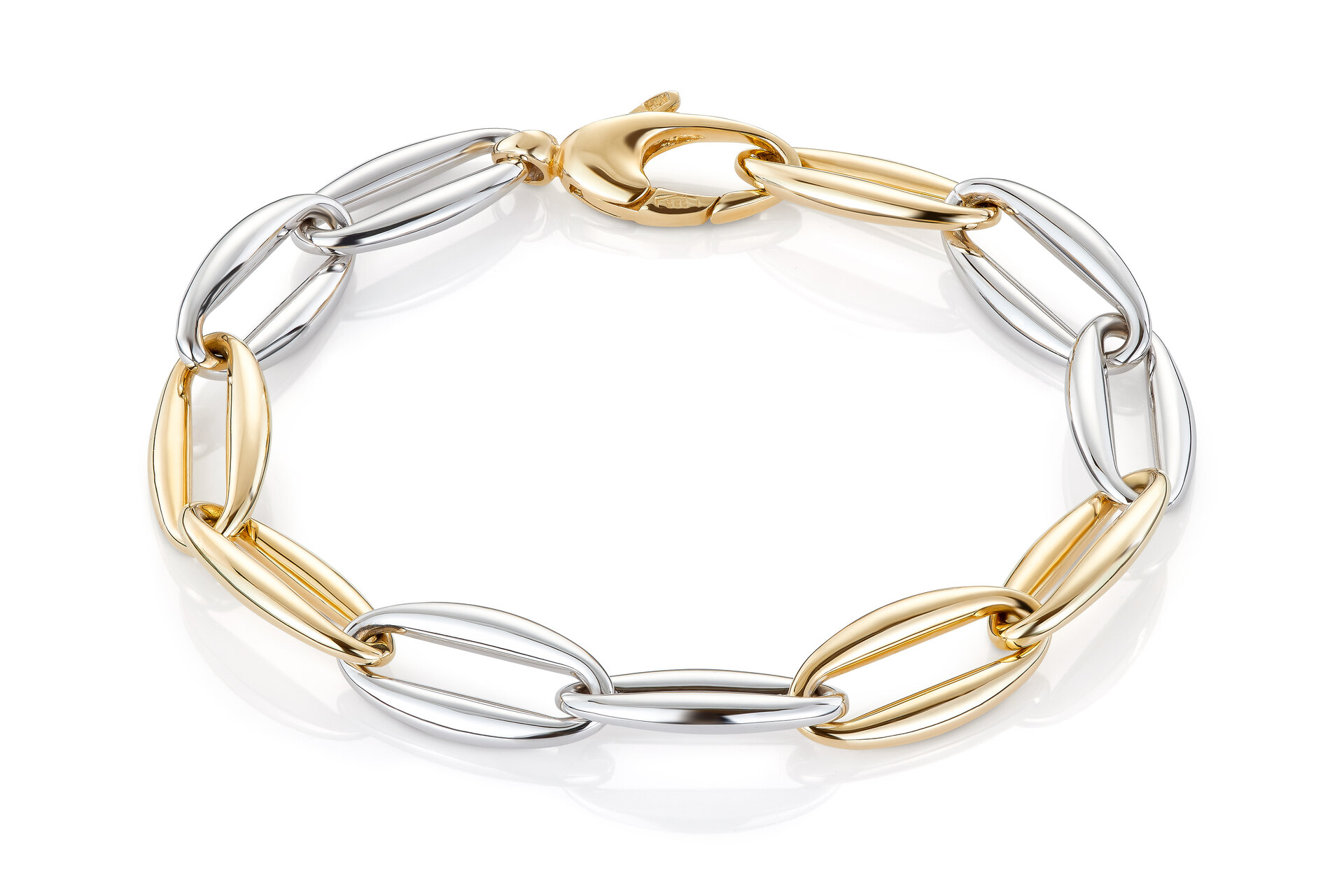 Haakonsen armbånd i gull og hvitt gull.