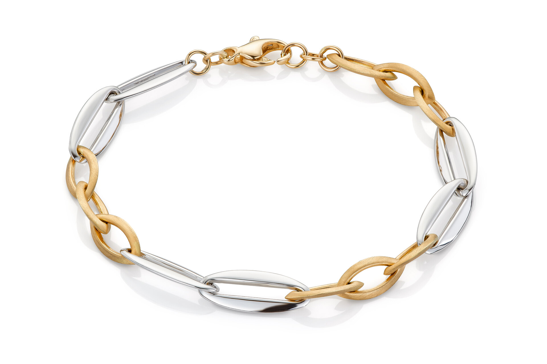 Haakonsen armbånd i gull og hvitt gull.