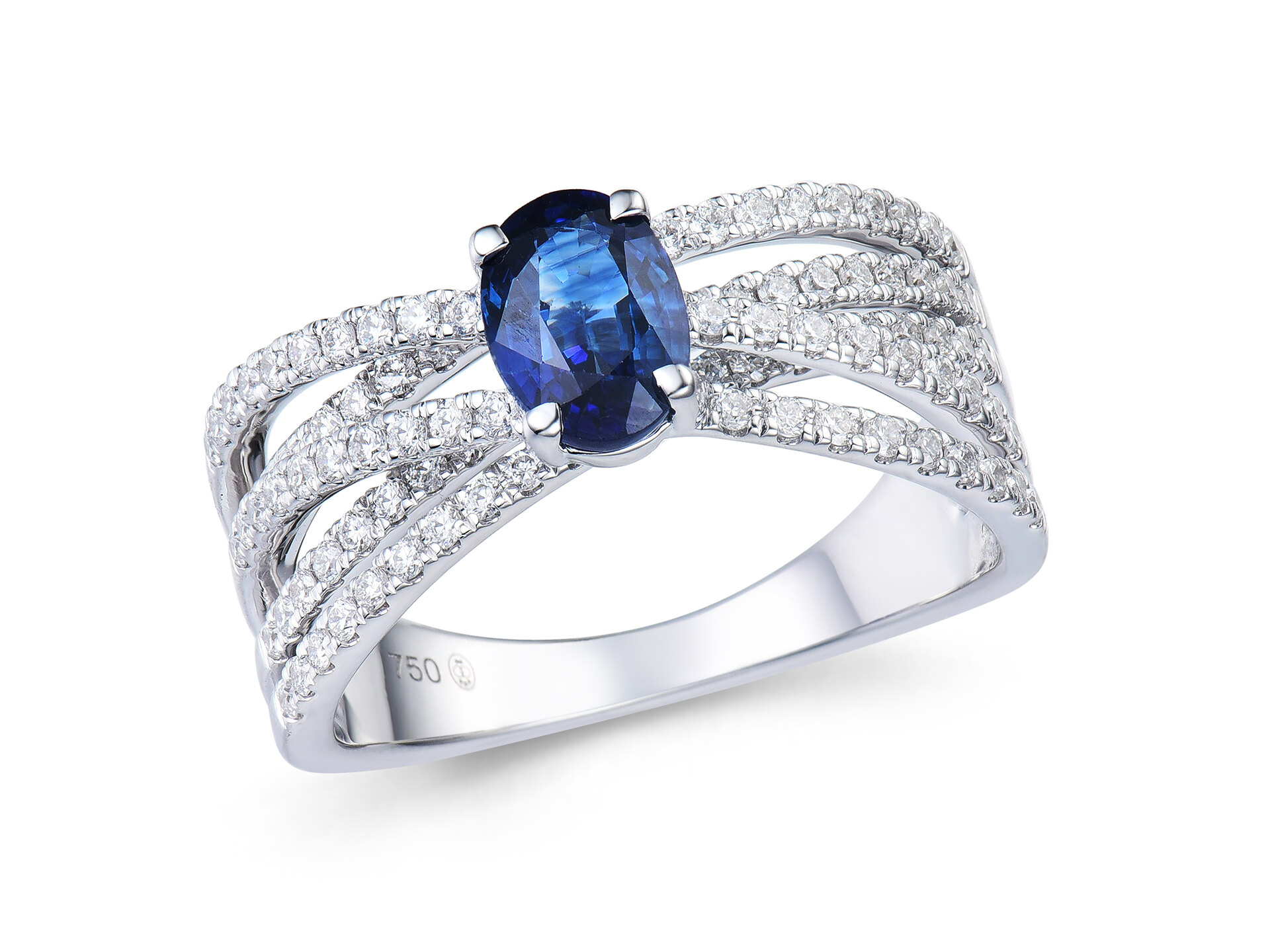 Haakonsen ring i hvitt gull med safir og diamanter 0.58 ct.